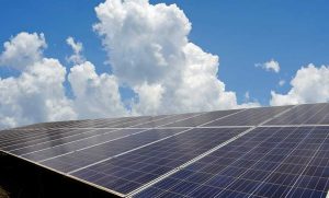 solar panels under a blue sky